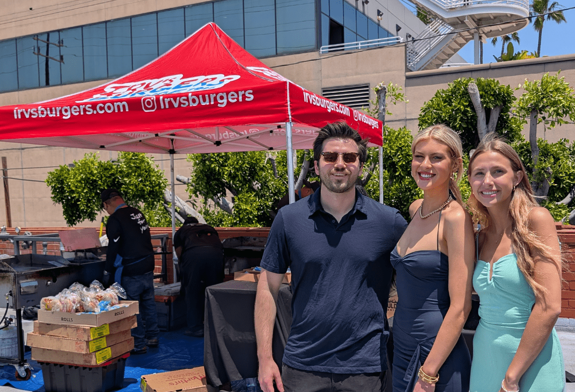 Featured image for post Burgers & Barrel: Irv’s Burgers Heats Up The Range LA’s Summer Kickoff Members Event